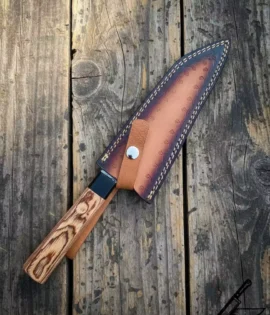 Handmade Damascus steel chef knife with leather sheath.