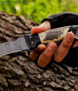 Close-up of Twist Pattern Damascus Fixed Blade Knife (1095 & 15N20 Steel).