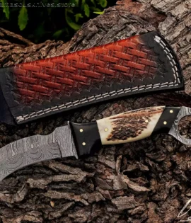 Hand Forged Damascus Hawkbill Knife with Sambar Stag Handle and Cowhide Sheath.